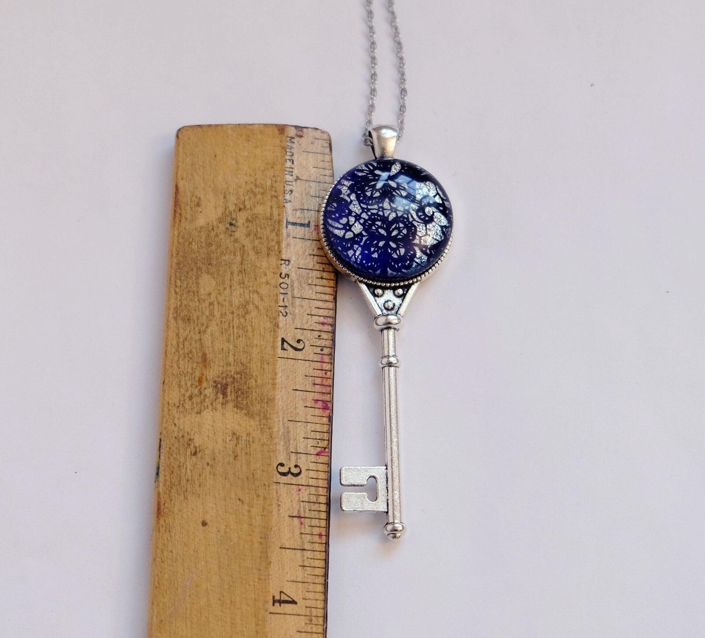 Silver tone Skeleton Key pendant necklace with Fused Glass blue and silver dichroic Lace cabochon on 24 inch steel chain jewelry