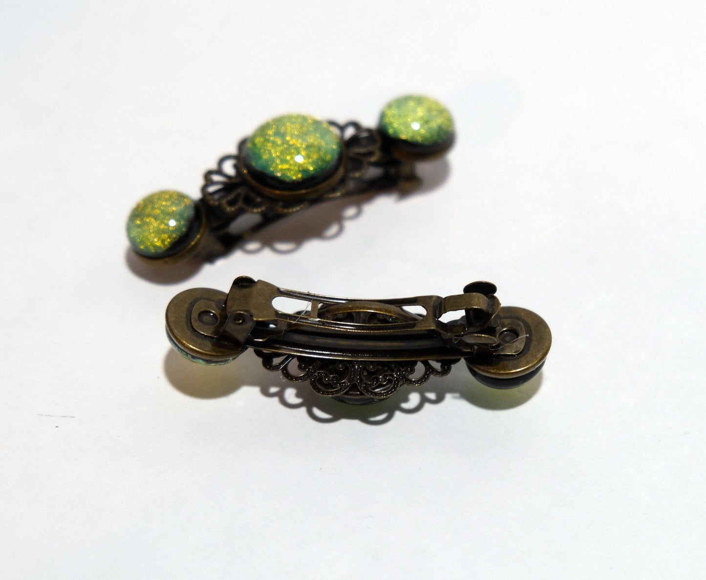 Barrette pair, bronze flowers with yellow/green dichroic fused glass cabochons, french clip, 2 1/4 inches