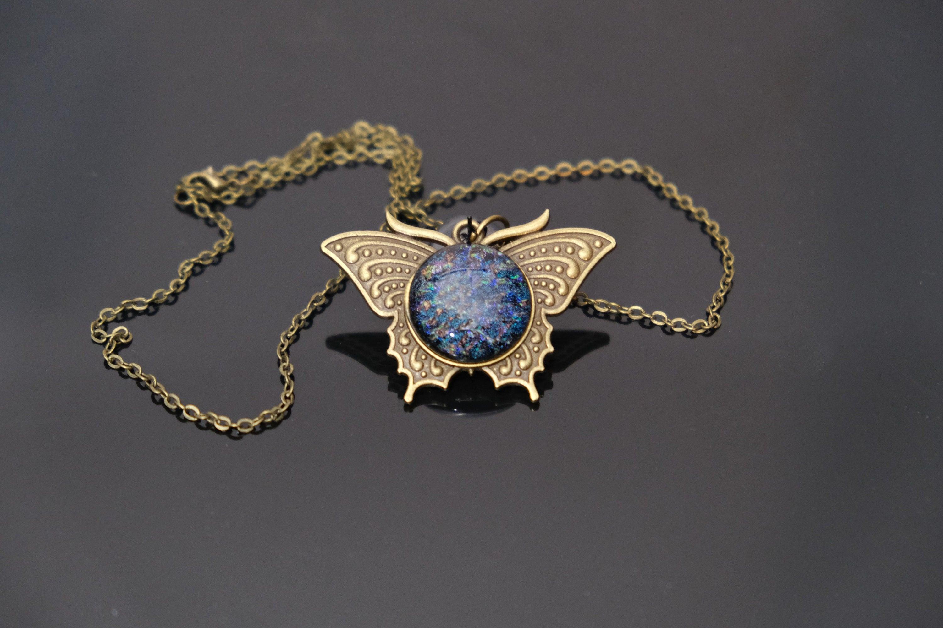 Butterfly pendant necklace, brass tone with blue/multicolor