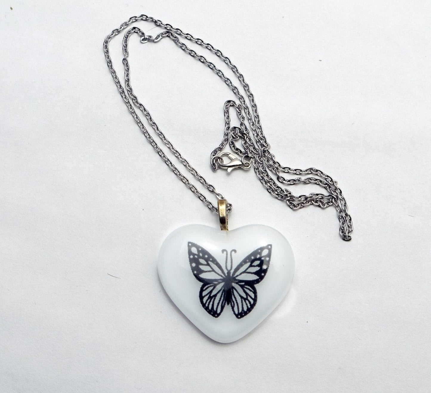 White fused glass heart with Black Butterfly on 18 inch black cord or 20 inch steel chain pendant necklace jewelry