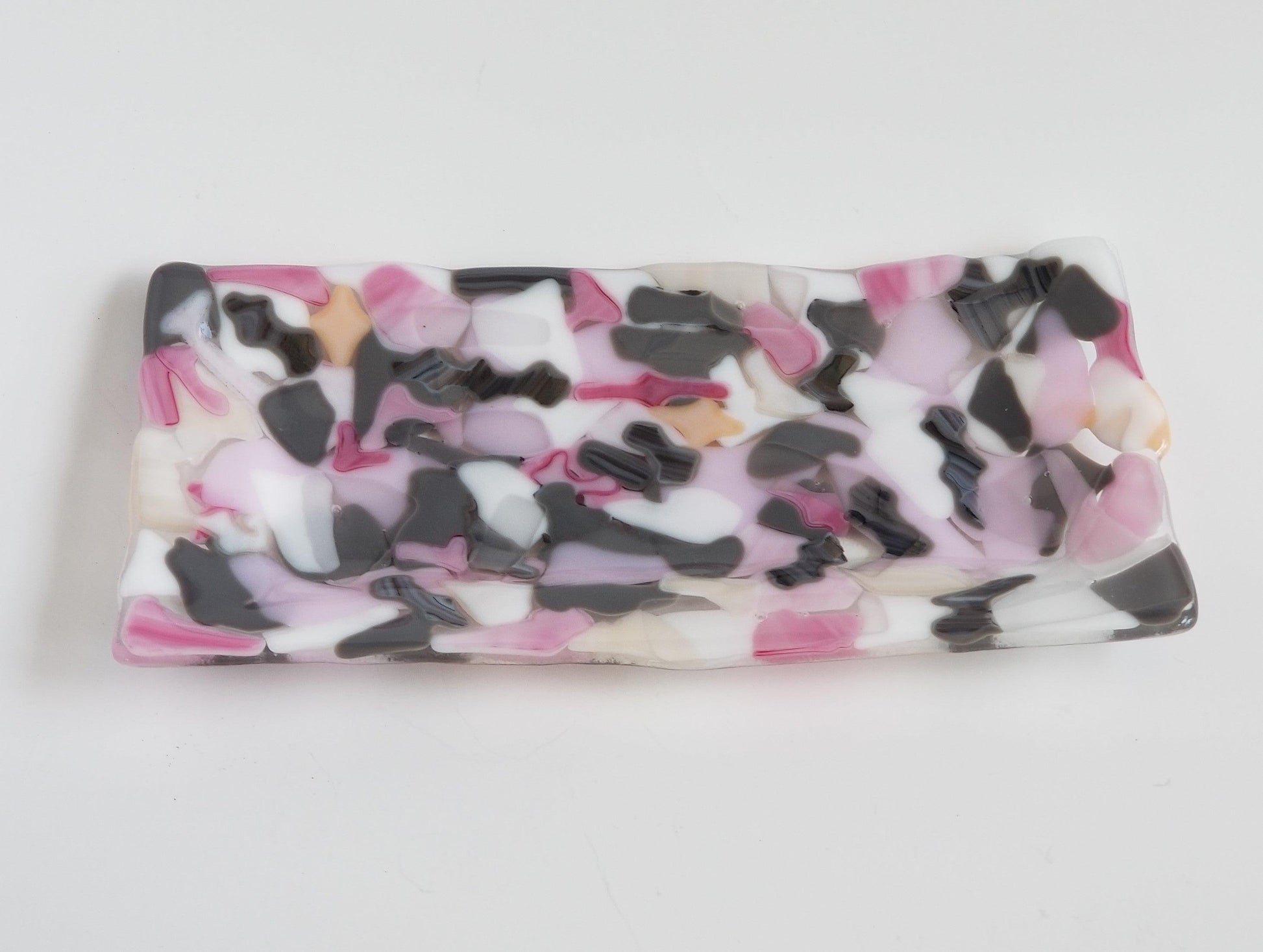 pink gray and white fused glass serving platter, spa and candle from seeds glassworks